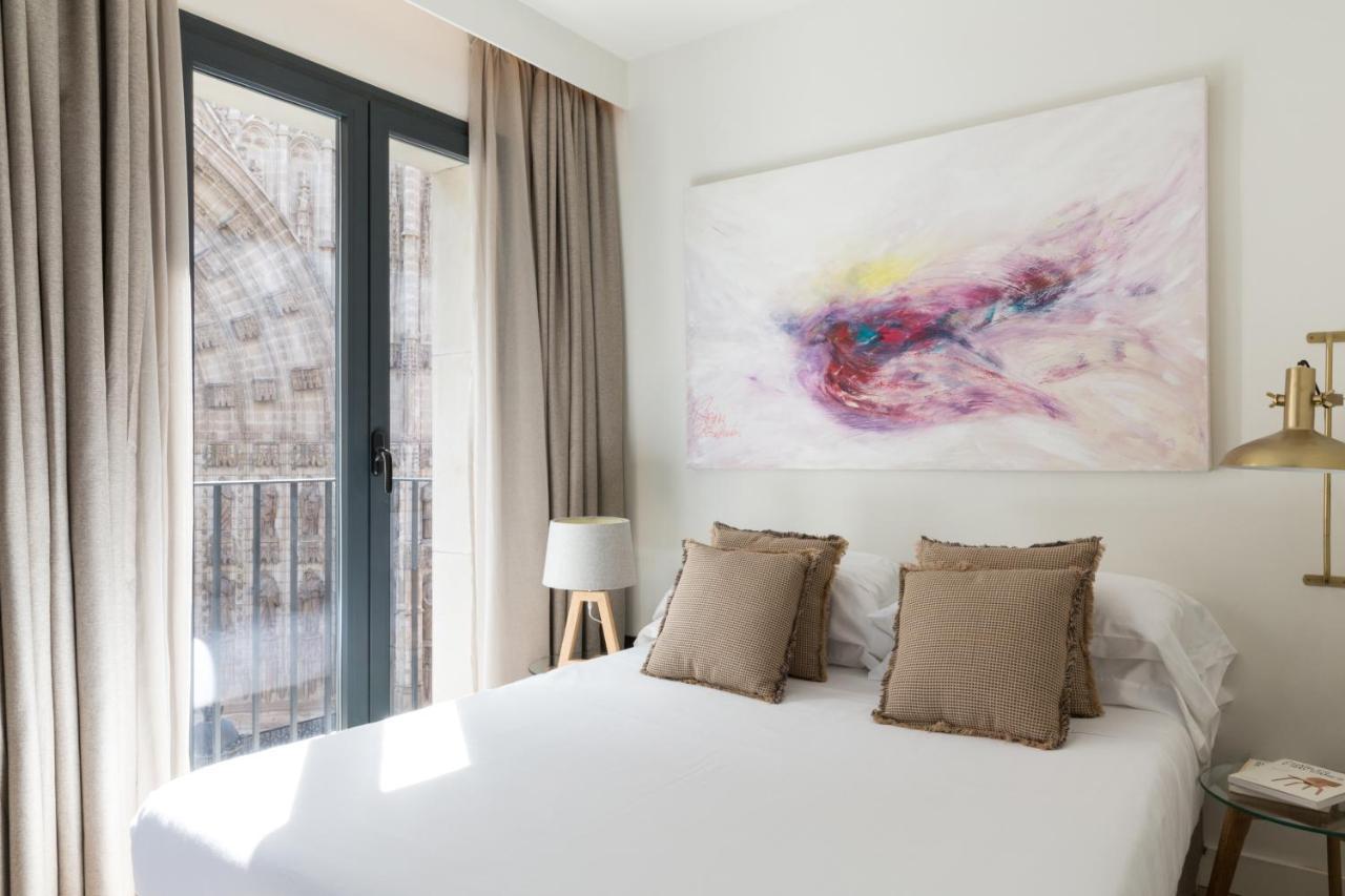 Puerta Catedral Suites Sevilla Bagian luar foto