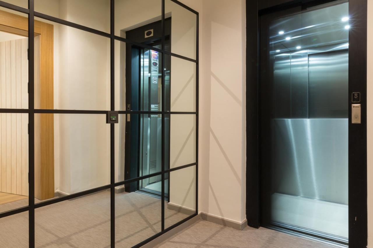 Puerta Catedral Suites Sevilla Bagian luar foto