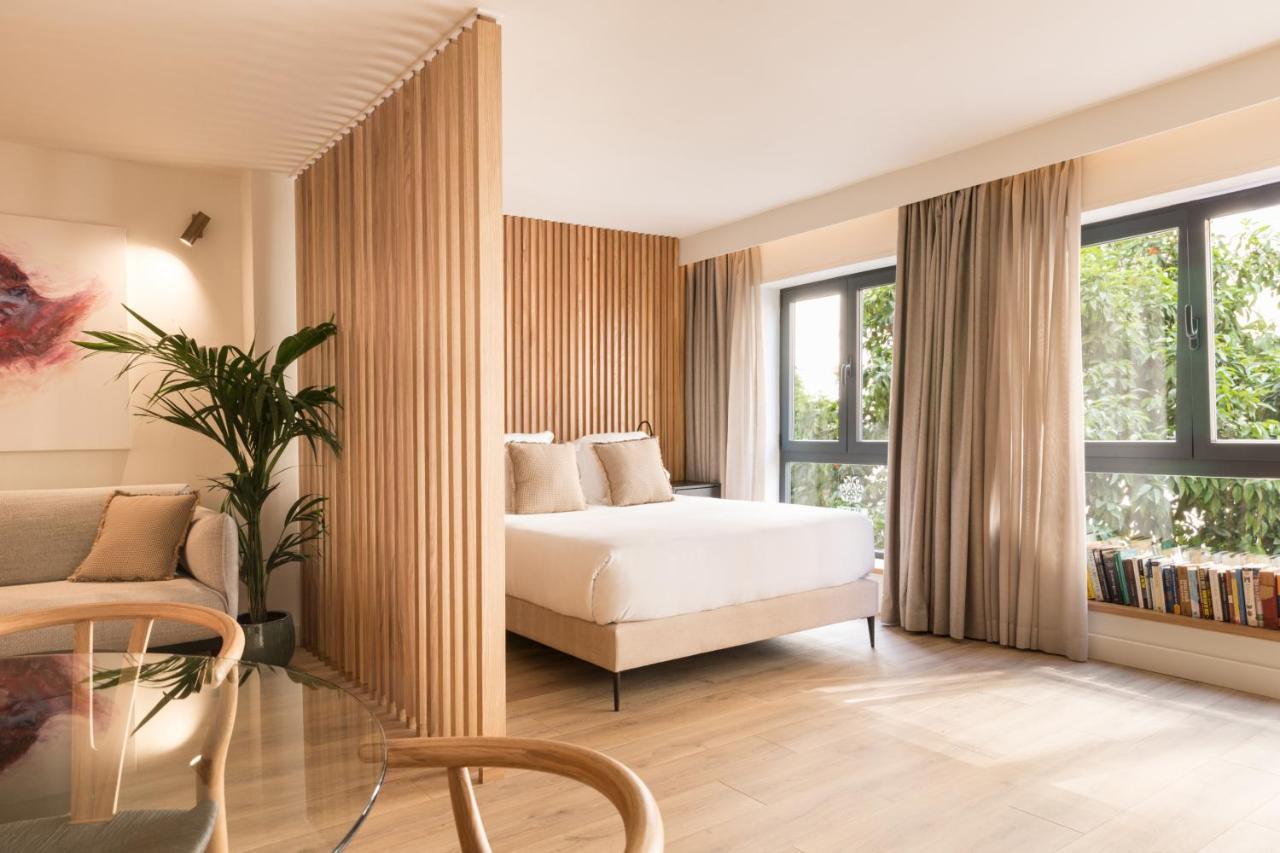 Puerta Catedral Suites Sevilla Bagian luar foto