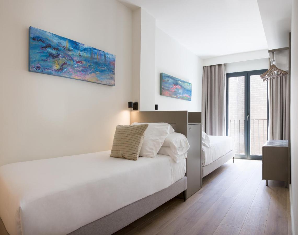 Puerta Catedral Suites Sevilla Bagian luar foto